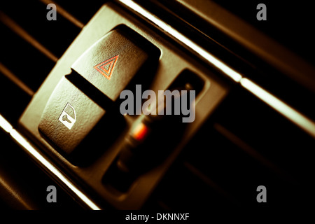 Detail of a warning button in a car Stock Photo