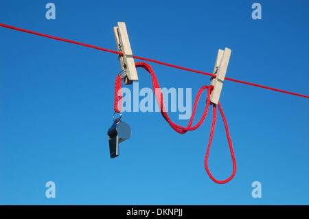 (dpa FILE) Illustration - An archive picture, dated 14 June 2013, shows a whistle hanging from a washing line in Germany. Fotoarchiv für Zeitgeschichte/Steinach - ATTENTION! NO WIRE SERVICE - Stock Photo