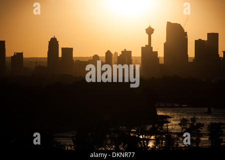 City of Calgary skyline in silhouette at dusk. Stock Photo