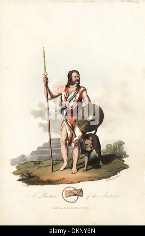 Pre-Roman Briton of the interior, carrying shield, spear and battle axe. Stock Photo