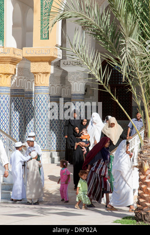 Libya, Zliten. Women Leaving the Mausoleum of Sidi Abdulsalam al-Asmar al-Fituri after prayers. Stock Photo