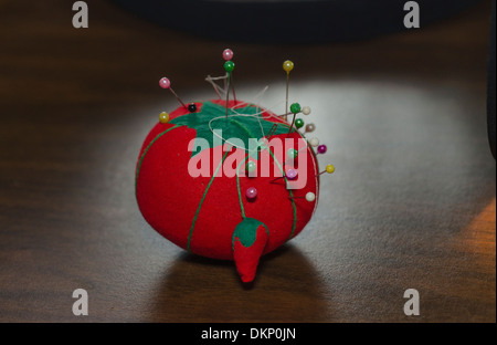 Let's sew!  an vintage tomato pin cushion Stock Photo