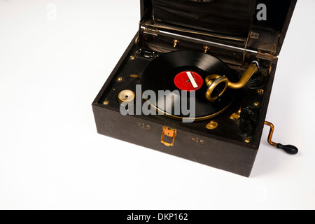An old battered record player audio device that closes like a suitcase Stock Photo