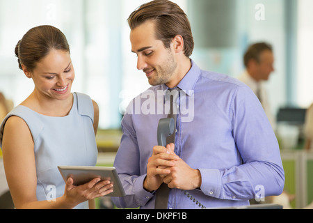 Business people using digital tablet in office Stock Photo