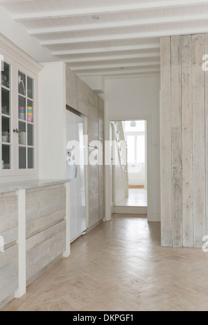 Cupboards and refrigerator in kitchen Stock Photo