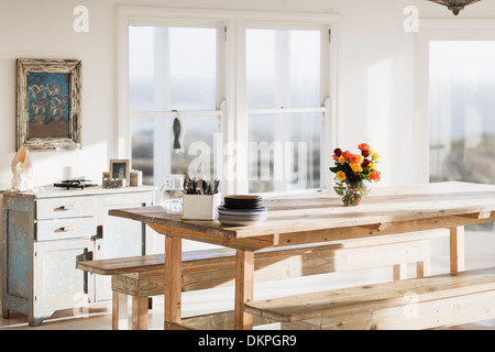 Wooden table in dining room Stock Photo