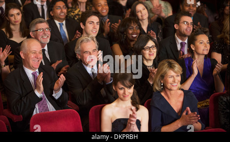 Clapping theater audience Stock Photo