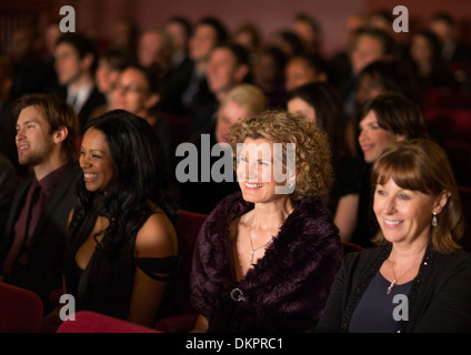 Smiling theater audience Stock Photo
