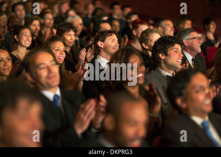 Clapping theater audience Stock Photo