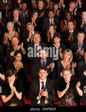 Clapping theater audience Stock Photo