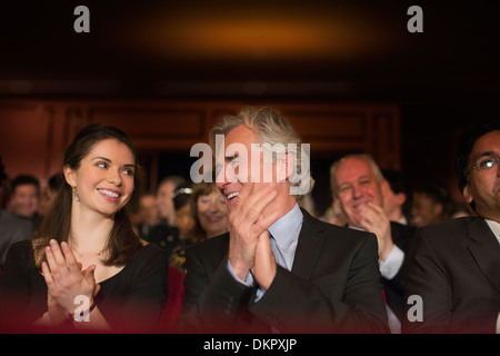 Clapping theater audience Stock Photo