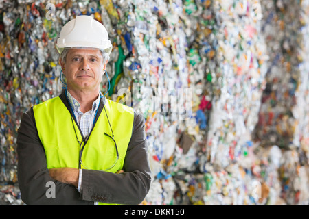 Supervisor standing in recycling plant Stock Photo