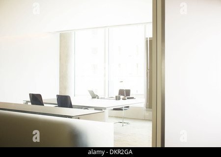 Mirrors in empty office Stock Photo