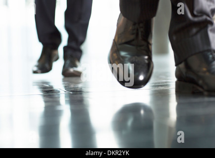 Close up of businessmens feet Stock Photo