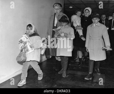 Dec. 17, 1962 - London, England, U.K. - Children of Academy Award winning actress Elizabeth Taylor, LIZA TODD, CHRISTOPHER WILDING, MICHAEL WILDING, JR. and MARIA arrive in London with their nurse to spend Christmas with their mother. (Credit Image: © KEYSTONE Pictures USA) Stock Photo