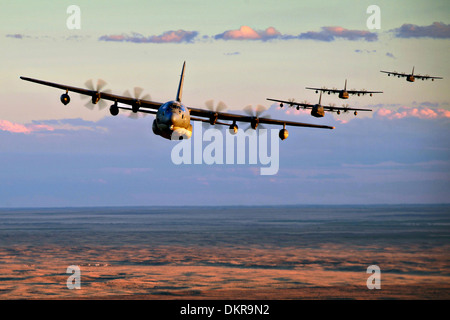 Five US Air Force MC-130J Commando special operation transport aircraft conduct low-level formation training November 5, 2013 over Clovis, N.M. Stock Photo