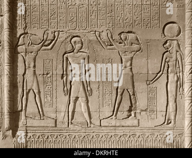 ancient stone relief at Chnum temple in Egypt in sunny ambiance Stock Photo