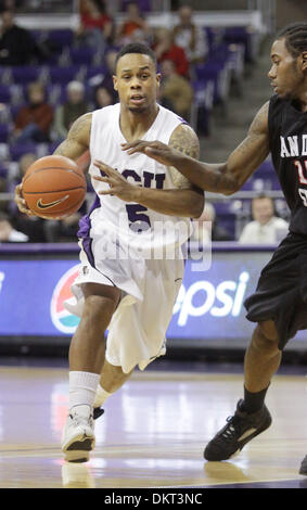 Feb 16, 2010 - Fort Worth, Texas, USA - San Diego State forward KAWHI LEONARD (right) defends against Texas Christian guard RONNIE MOSS (5) during the Aztecs' 68-51 victory at Daniel-Meyer Coliseum in Fort Worth. San Diego State made 61 percent of its shots from the field, but only one three-point basket. (Credit Image: © Robert Hughes/ZUMA Press) Stock Photo