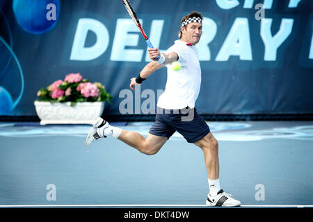 Feb. 20, 2010 - Delray, FL - Florida, USA - United States - fl-delray-champions-tennis-0220h   Pat Cash reaches for a  backhand return on the run against Patrick Rafter during a ATP Champions Tour match at the Delray Beach Tennis Center..  Photo/Michael Francis McElroy, for the South Floirda Sun-Sentinel (Credit Image: © Sun-Sentinel/ZUMApress.com) Stock Photo