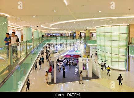 Interior of a large modern shopping mall on Wangfujing street dajie Beijing city centre center PRC people's republic of china Stock Photo