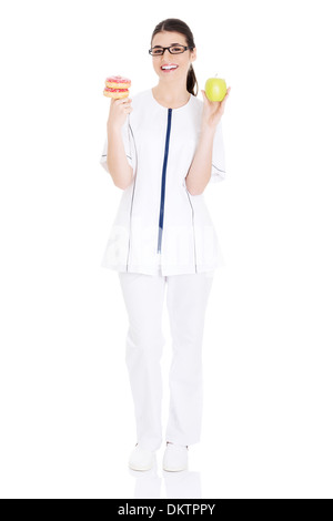 A Female Doctor Who Knows The Effects Of Vitamin C. On A White Background.  Royalty Free SVG, Cliparts, Vectors, and Stock Illustration. Image  170971906.