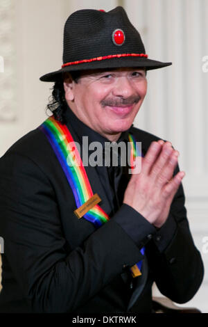 Washington, DC. 8th Dec, 2013. Kennedy Center Honoree Carlos Santana attends a reception at the White House for the 2013 Kennedy Center Honorees on December 8, 2013 in Washington, DC. Credit: Kristoffer Tripplaar / Pool via CNP/dpa/Alamy Live News Stock Photo