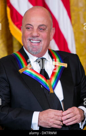 Washington, DC. 8th Dec, 2013. Kennedy Center Honoree Billy Joel attends a reception at the White House for the 2013 Kennedy Center Honorees on December 8, 2013 in Washington, DC. Credit: Kristoffer Tripplaar / Pool via CNP/dpa/Alamy Live News Stock Photo