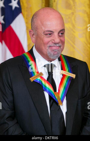 Washington, DC. 8th Dec, 2013. Kennedy Center Honoree Billy Joel attends a reception at the White House for the 2013 Kennedy Center Honorees on December 8, 2013 in Washington, DC. Credit: Kristoffer Tripplaar / Pool via CNP/dpa/Alamy Live News Stock Photo