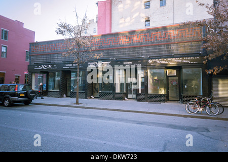 Vacant retail space in taxpayers on Eighth Street in Greenwich Village Stock Photo