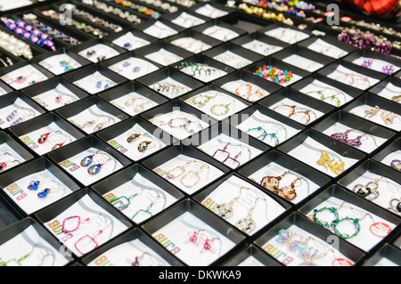 Handmade jewelery on sale at a market stall Stock Photo