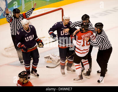 Feb. 27, 2010 - Vancouver, British Columbia, Canada - Olympics Men's Hockey -USA's Jack Johnson and Canada's Mike Richards are held apart from officials in the first period in Men's Gold Medal Hockey  game at the 2010 Winter Olympic on February 27, 2010 in Vancouver, British Columbia. (Credit Image: © Paul Kitagaki Jr./ZUMApress.com) Stock Photo