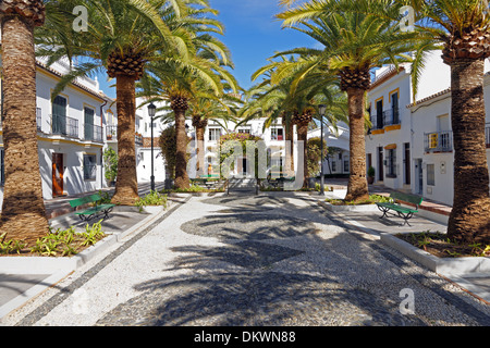 Europe Spain ES Andalusia Benalmadena Pueblo Plaza street view Andalusian palms architecture building construction plants Stock Photo