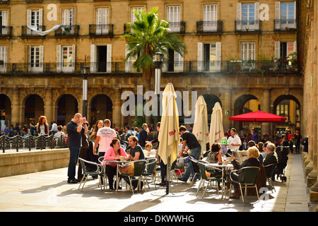 People sitting at the Bar terrace in Plaza Nueva, Bilbao, Biscay, Basque Country, Spain, Europe Stock Photo