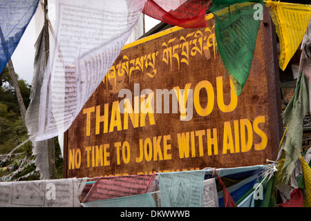 Bhutan, Yotang La pass, no time to joke with Aids Awareness sign Stock Photo