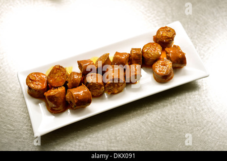 Spanish Tapa of Chorizo Stock Photo - Alamy