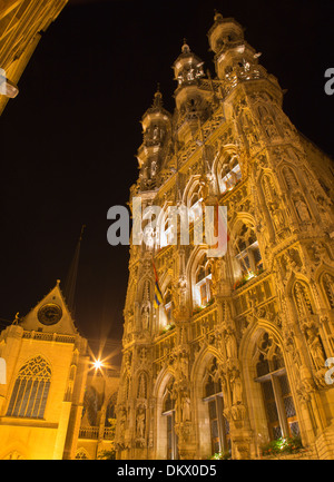 Leuven - north-east portal of Gothic town hall at night Stock Photo