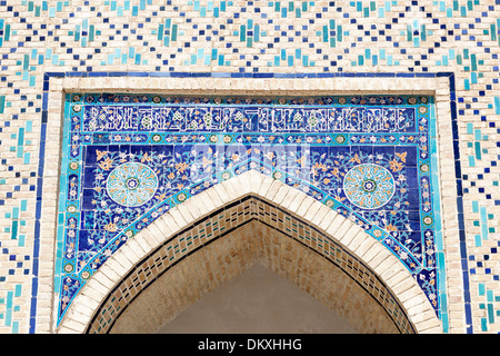 Tiled decorative arch in courtyard, Kalon Mosque, also known as Kalyan Mosque, Poi Kalon, Bukhara, Uzbekistan Stock Photo