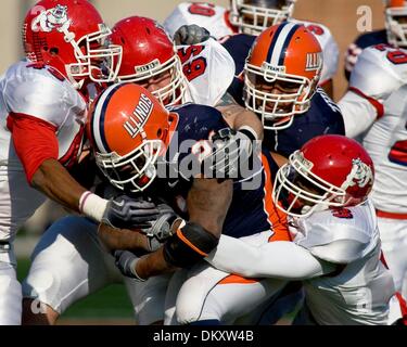 Dec 05, 2009 - Champaign, Illinois, USA - Fresno State defenders CHRIS CARTER (43), CHASE MCENTEE (65), and MOSES HARRIS (3) tackle Illinois running back JASON FORD (21) in the game between the University of Illinois and Fresno State at Memorial Stadium in Champaign, Illinois.  Fresno State defeated Illinois 53 to 52. (Credit Image: Â© Mike Granse/ZUMA Press) Stock Photo