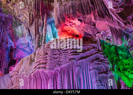 colorful limestone cave with perfect reflections in water Stock Photo ...