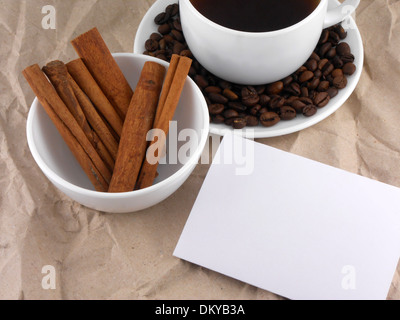 cup of cappuccino with cinnamon and coffee beans Stock Photo