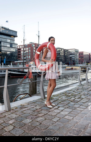 Young woman, summer dress, HafenCity, Hamburg, Germany Stock Photo