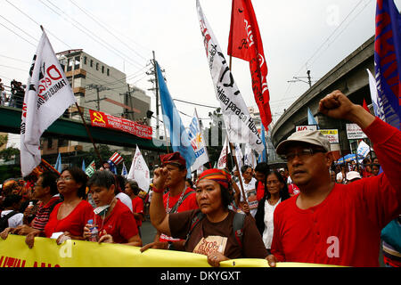 Manila, Philippines. 10th Dec, 2013. Activists march during a protest rally commemorating the International Human Rights Day in Manila, the Philippines, on Dec. 10, 2013. Credit:  Rouelle Umali/Xinhua/Alamy Live News Stock Photo