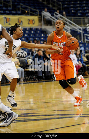 Feb. 02, 2010 - Pittsburgh, PA, U.S - 2 February 2010: University of Pittsburgh junior guard Brittaney Thomas (12) tries to poke the ball out of the hands of Syracuse University freshman guard Elashier Hall (2) in the second half of NCAA Big East women's basketball at the Petersen Events Center in Pittsburgh, PA....Syracuse won in overtime 87-80..Mandatory Credit: Dean Beattie / So Stock Photo