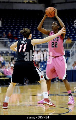 Feb. 14, 2010 - Pittsburgh, PA, U.S - 14 February 2010: University of Pittsburgh junior forward Chelsea Cole (22) waits for her teammate to get open as University of Louisville sophomore guard Becky Burke (11) defends at the top of the key in the first half of NCAA women's Big East basketball action at the Petersen Events Center in Pittsburgh, PA...The Pitt Panthers players are wea Stock Photo