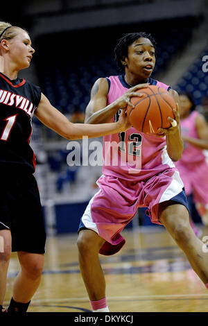 Feb. 14, 2010 - Pittsburgh, PA, U.S - 14 February 2010: University of Louisville freshman guard Shelby Harper (1) tries to get the ball out of University of Pittsburgh junior guard Brittaney Thomas (12) as she looks to make a pass in the first half of NCAA women's Big East basketball action at the Petersen Events Center in Pittsburgh, PA...The Pitt Panthers players are wearing pink Stock Photo