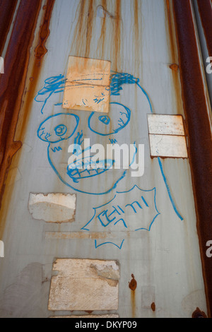 Graffiti of face on alley wall - Seoul, South Korea Stock Photo