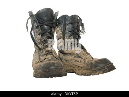 A pair of dirty hiking boots isolated over white Stock Photo