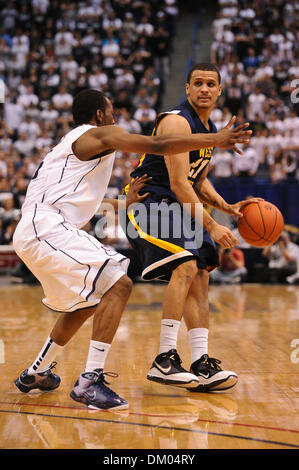 Feb. 22, 2010 - Hartford, Connecticut, U.S - 22 February 2010: West Virginia's Joe Mazzulla (21) looks toward the hoop past Connecticut's Kemba Walker (15) during game action in the first half. Connecticut defeated #7 West Virginia 73 - 62  at the XL Center in Hartford, Connecticut. (Credit Image: © Geoff Bolte/Southcreek Global/ZUMApress.com) Stock Photo