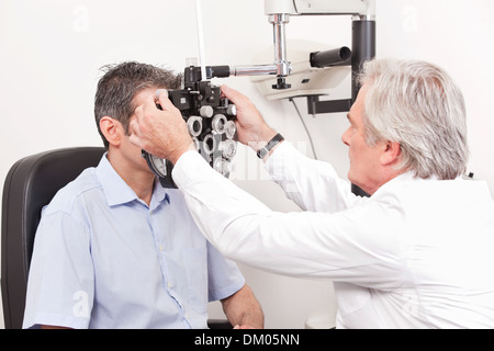 Optometrist Doing Sight Testing Stock Photo