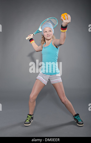 female tennis player with paprika instead of ball Stock Photo